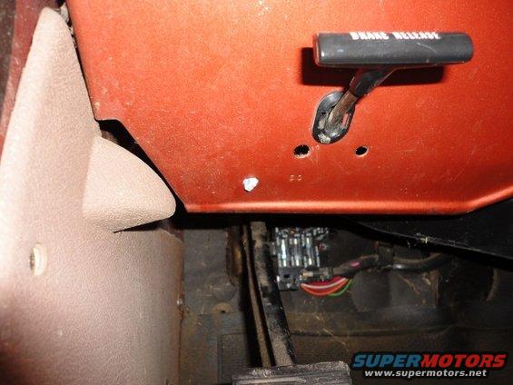 Original Turn Signal Flasher location under dash (light blue tab sticking through)