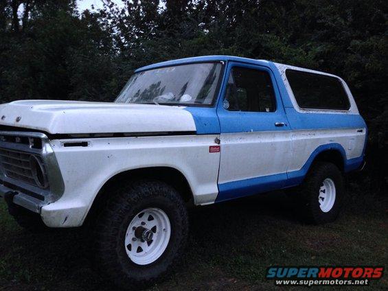 Two-tone blue and white 1979 Ford Bronco parked outdoors