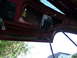 1993 Mazda MX-3 - Interior view of the trunk lid on a 1993 Mazda MX-3, showing the latch assembly and wiring.