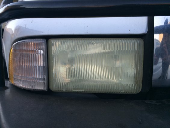 Front view of a 1997 Dodge 3500's headlights and turn signal