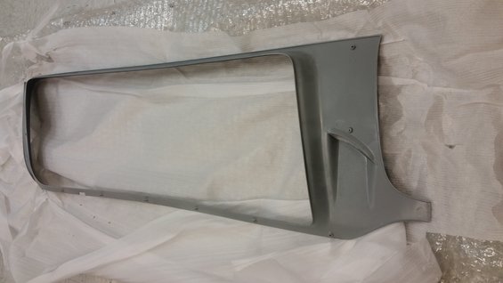 gray grille surround, possibly for a truck