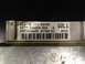 1993 Ford Bronco - Engine control module with visible part numbers and barcode.