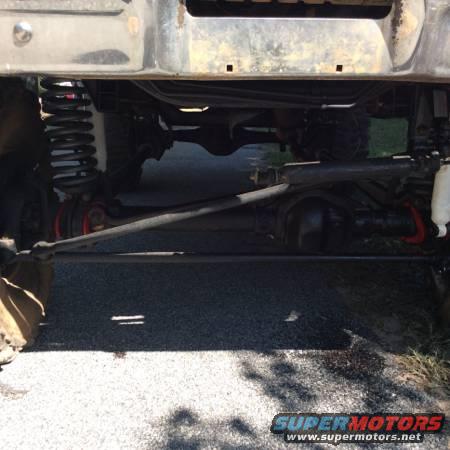 Undercarriage view of vehicle suspension and steering components