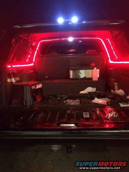 Truck bed interior with red and blue LED accent lighting