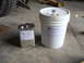 1992 Ford Bronco - Two containers of US Composites urethane pour foam are shown on a concrete floor.