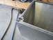 1992 Ford Bronco - A partially constructed metal box is shown from a close-up angle, resting on a workshop floor.