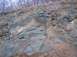 1990 Ford Bronco - Rocky outcrop along a road, likely during late fall or winter.
