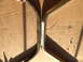 1997 Dodge 3500 - Comparison of a used sway bar with a new gold sway bar, both on a cardboard surface.