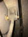 1997 Dodge 3500 - Close-up of a vehicle's sway bar link, showing its connection point and bushings.
