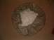 1996 Ford Bronco - A brown vinyl spare tire cover with an elasticized edge is shown laid out on a carpeted surface.