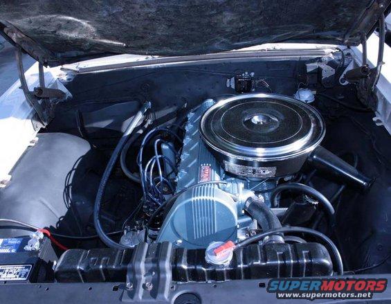 1967 Pontiac Grand Prix engine bay with V8 engine, air cleaner, and radiator