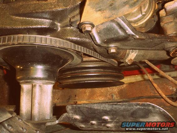 Engine crankshaft pulley with a V-belt routed around it