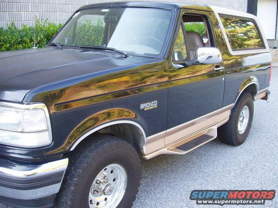 1996 Ford Bronco, dark blue and tan two-tone paint, side view