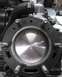 1900 Honda Big Red - Close-up of an engine cylinder and piston, with visible part identification numbers.