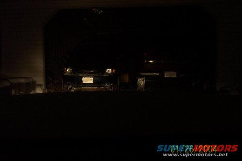 100_1470(small).jpg Comparison of H4 and stock light from inside car