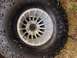 1979 Ford Bronco - This image shows a close-up of an off-road tire and wheel, not a 1979 Ford Bronco.