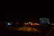 2003 Ford Taurus - Driving at night on a highway with a GPS unit visible on the dashboard.