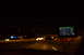 2003 Ford Taurus - Driving at night with GPS and radar detector visible on the dashboard.