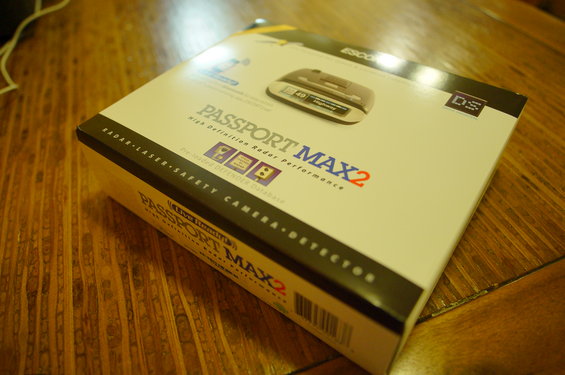Box for a Passport Max2 radar detector, showing a picture of the device