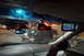 2003 Ford Taurus - Interior view of a car's dashboard equipped with a radar detector and GPS navigation system.