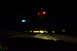 2003 Ford Taurus - View from inside a car at night, showing dashboard lights and the road ahead.