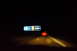 2003 Ford Taurus - A digital display on a car's dashboard shows the temperature and mileage at night.