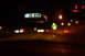 2003 Ford Taurus - A digital display shows temperature and altitude while driving on a highway at night.