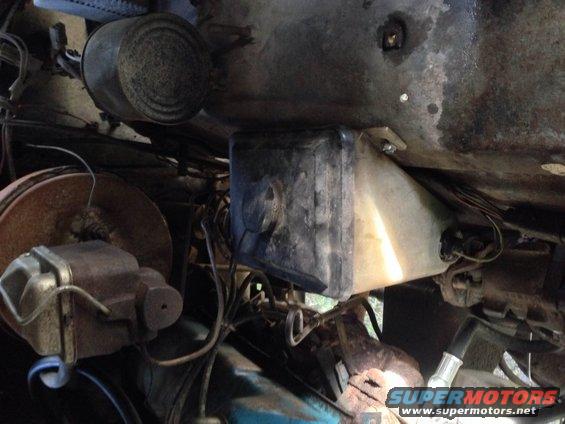 close-up of vehicle's brake master cylinder and fluid reservoir
