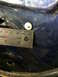 1990 Ford F-150 - A close-up view of a blue metal panel shows a white plastic clip and a ruler for scale.