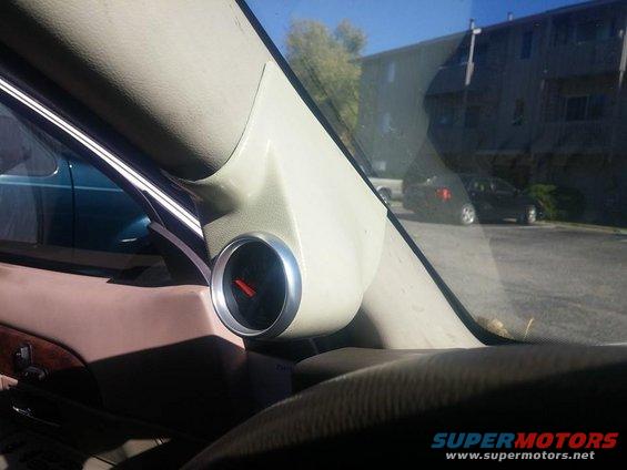 Interior gauge pod with a red-needled meter