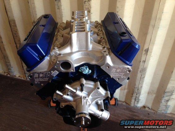 V8 engine with blue AFR valve covers and aluminum intake manifold