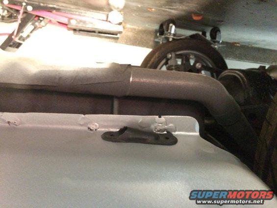 trunk-drain-grommet.jpg 1965 Mustang trunk drain grommet installed outside in