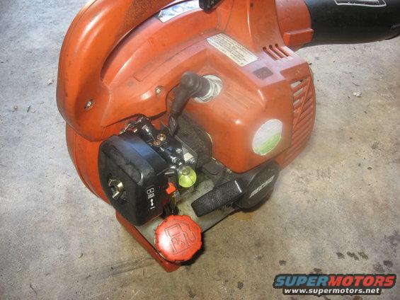 Orange and black Echo leaf blower engine with red fuel cap