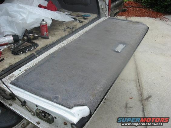 Tailgate interior carpet and latch mechanism