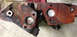 1993 Ford Bronco - Two engine cylinder heads, showing signs of wear and rust, are displayed with key areas circled in red.