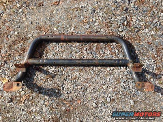 rusted bull bar with mounting brackets
