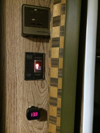 12 volt monitor reads 13.8 next to a start/stop switch