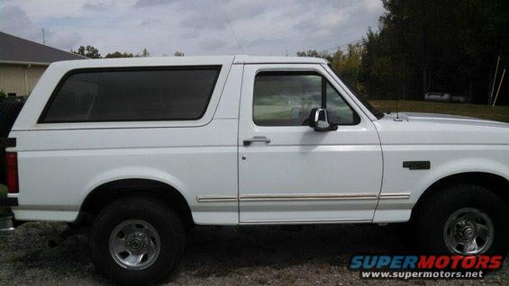 White 1995 Ford Bronco side view