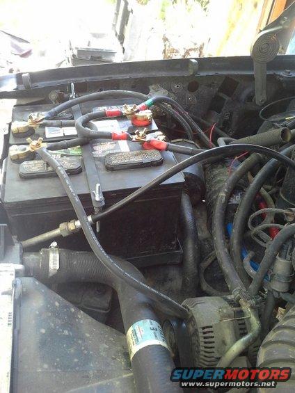 20140504_124226.jpg Final location with 1/0 welding wire. I used marine type terminals so I could borrow a battery for the tractor, or disconnect them and weld from them. 