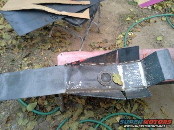 img_20141121_000947.jpg Started building up the sides at about a 45 degree angle, but eyeballed it. The front of my skid has a more rounded appearance. The back is probably closer to 35 degree. This should allow me to slide off anything, still be able to back up over something,  and the two different angles actually give the skid more structural strength. 