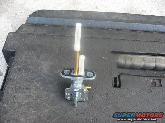 Motorcycle fuel petcock valve with OFF, RES, and FUEL settings