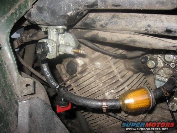 Motorcycle fuel filter and carburetor with fuel lines connected