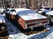 1974 Dodge Challenger - Junkyard find: a 1974 Dodge Challenger sits under a blanket of snow.