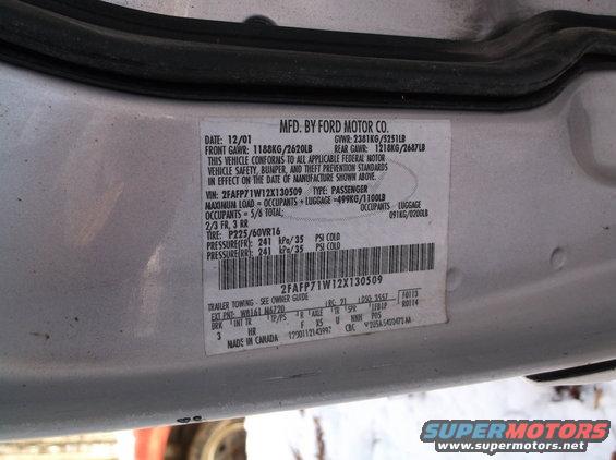 Door sticker with date 12/01 and VIN 2FAFP71W12X130509