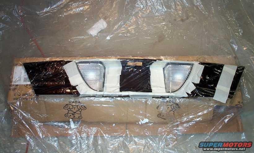 2001-fascia-masked.jpg The 2001 fascia, masked and ready to have the back up lenses tinted.