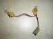 1992 Ford Explorer - A wiring harness with two light bulbs and a gray connector is shown.