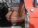 1961 Ford F-100 - A brief glimpse on the inside reveals the original seats, some carpet, and another section in desperate need of attenti…