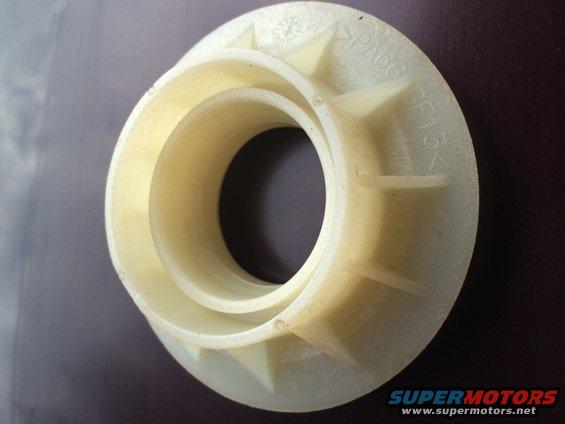 Plastic part with internal ridges and visible text 'PAG6'