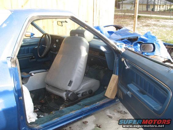 1972 Ford Ranchero interior, blue door panels, grey seats, dashboard visible