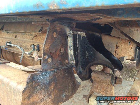 image.jpg New hanger installed. Had to cut top off so not to hit stuff. 
I did not do the hitch!! It will come off